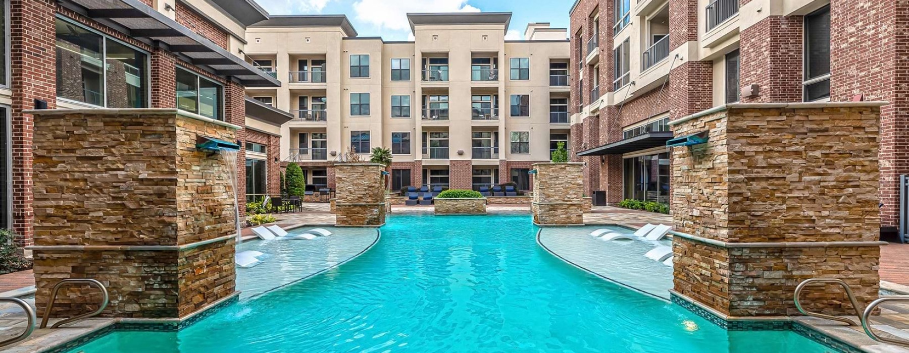 Resort-style pool at 2626 Fountain View apartments in Houston, TX.