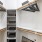 closet with hangers and shelves