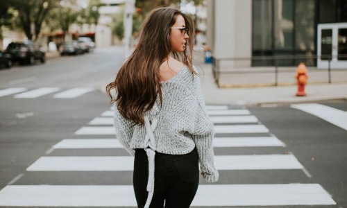 a person walking in a crosswalk