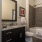 a bathroom with a shower and sink