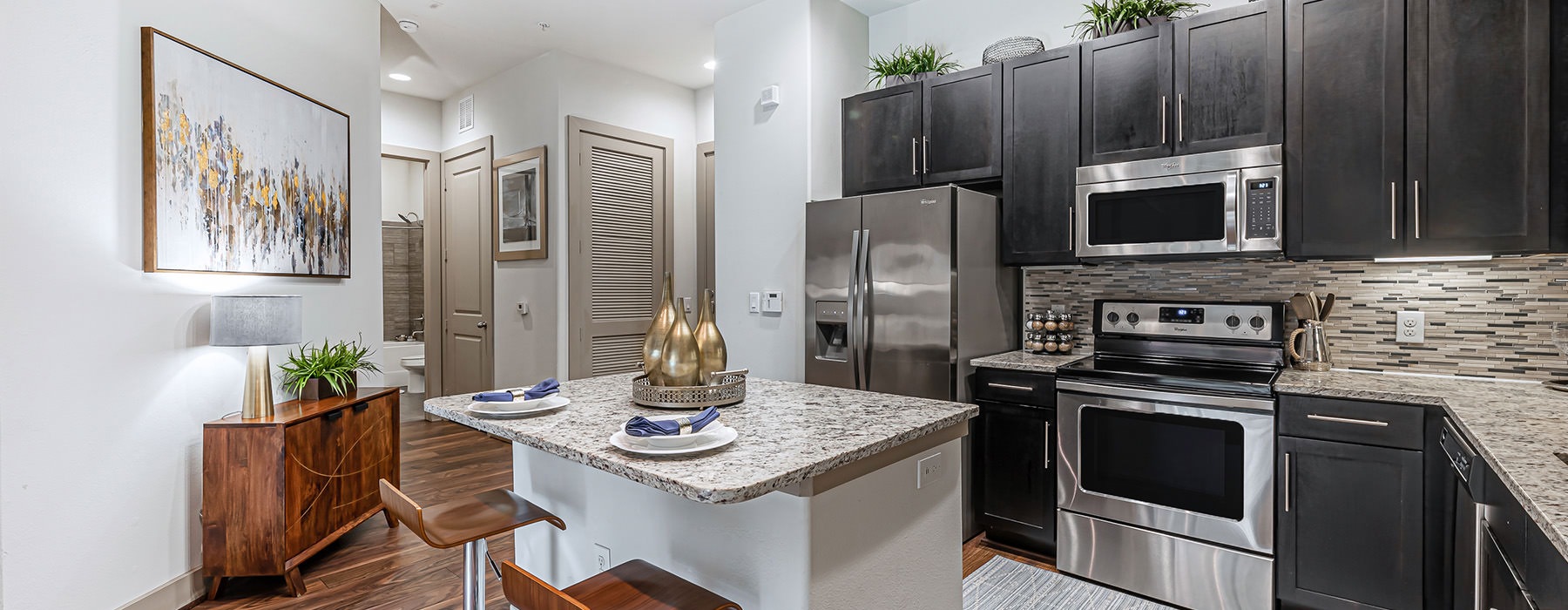 kitchen with stainless steel appliances and wood cupboards